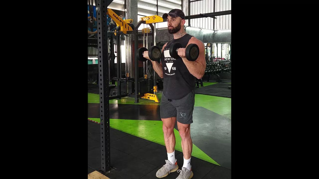 Dumbbell Alternating Curl With Pause exercise