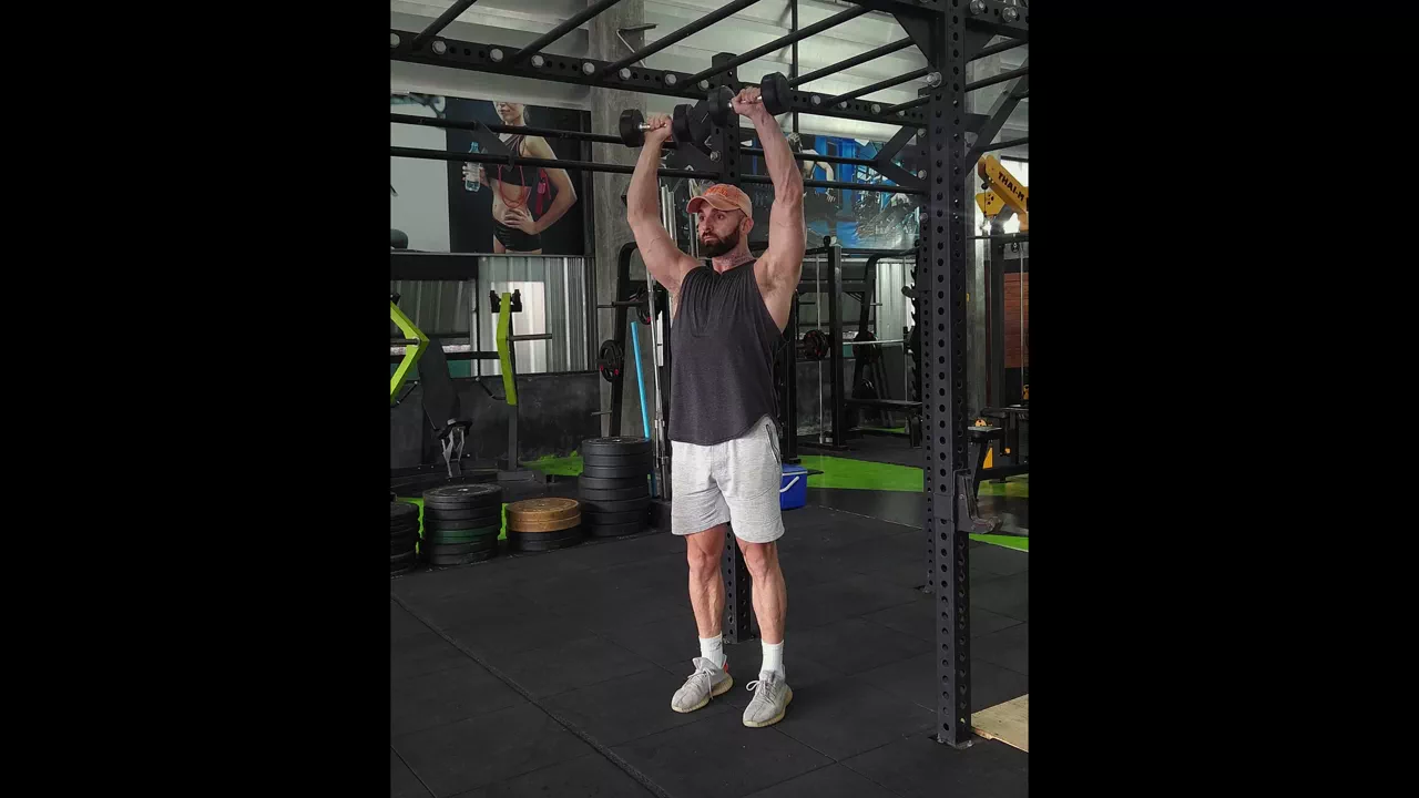 Standing Dumbbell Press exercise
